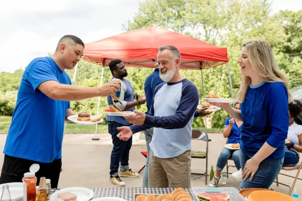 Friends Drinking Eating Tailgate Party